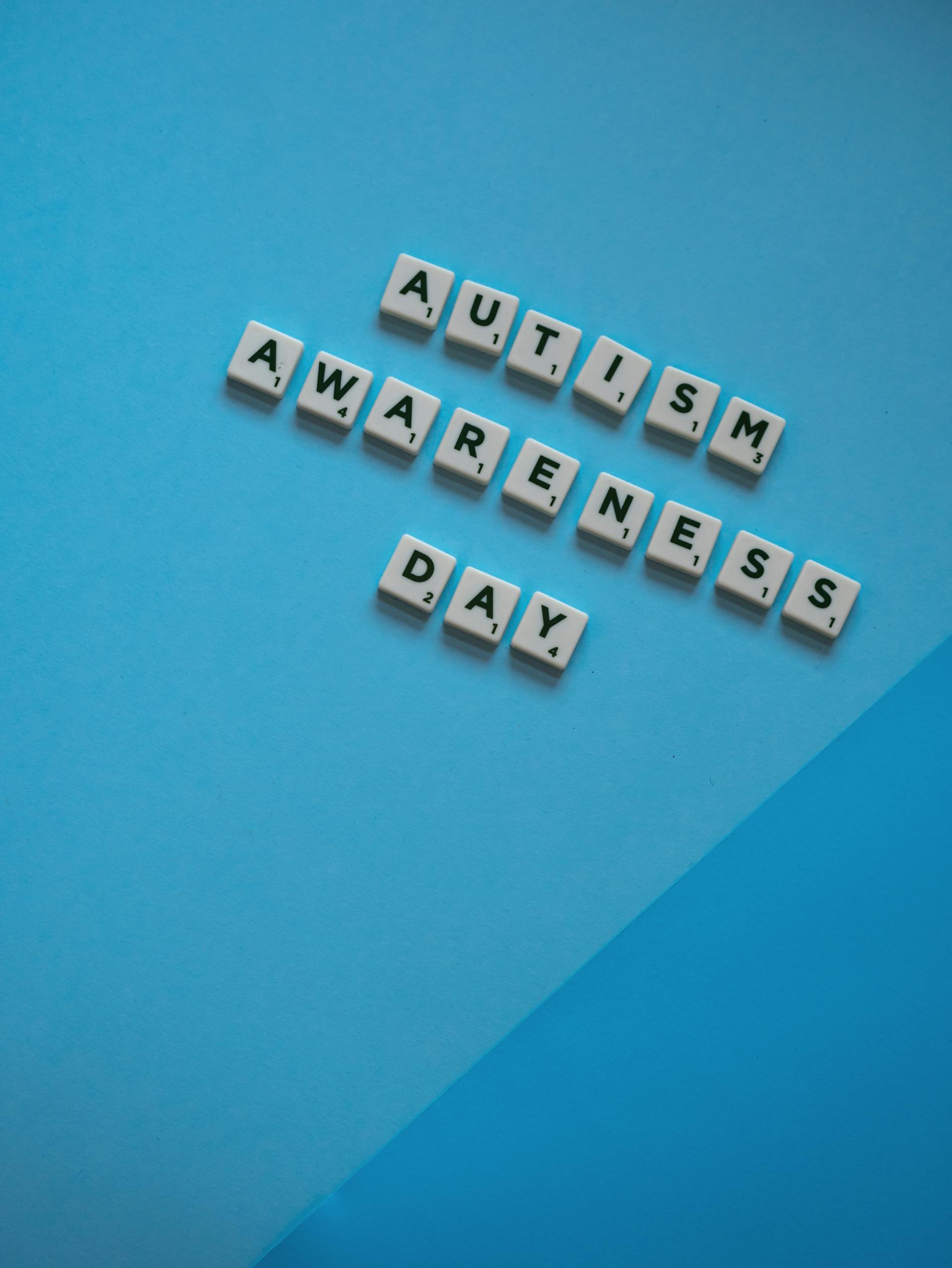 Overhead Shot of Autism Awareness Day in Scrabble Tiles